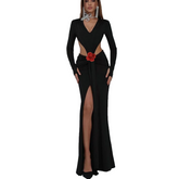 Black evening gown with a red flower detail on a white background
